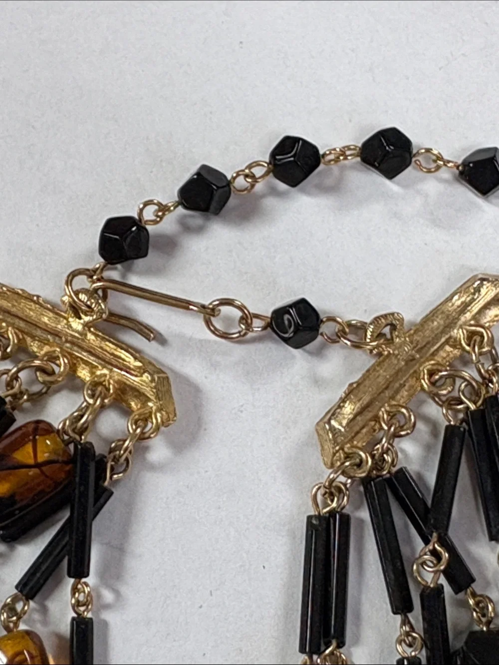 Gold-Accented Black and Amber Multi-Strand Necklace